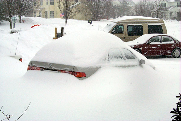 Snow drifts practically covering our Camry