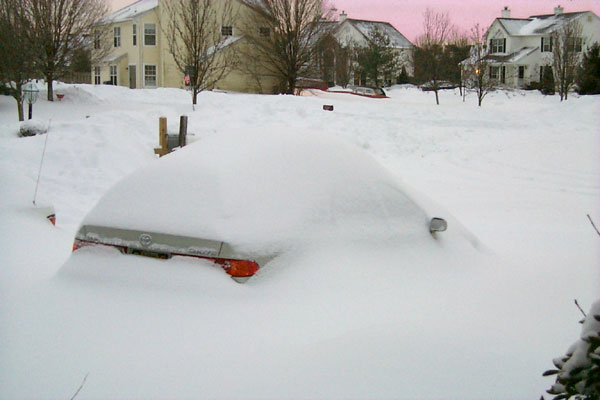 Camry covered by snow