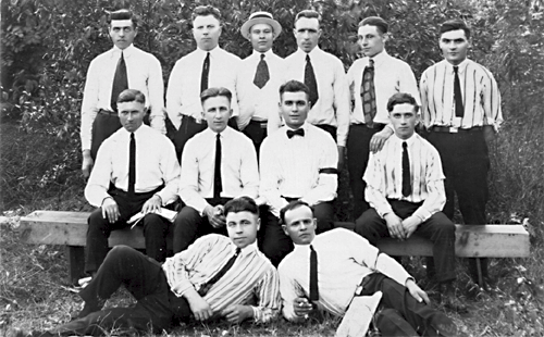Sobol in back row of group of 12 men